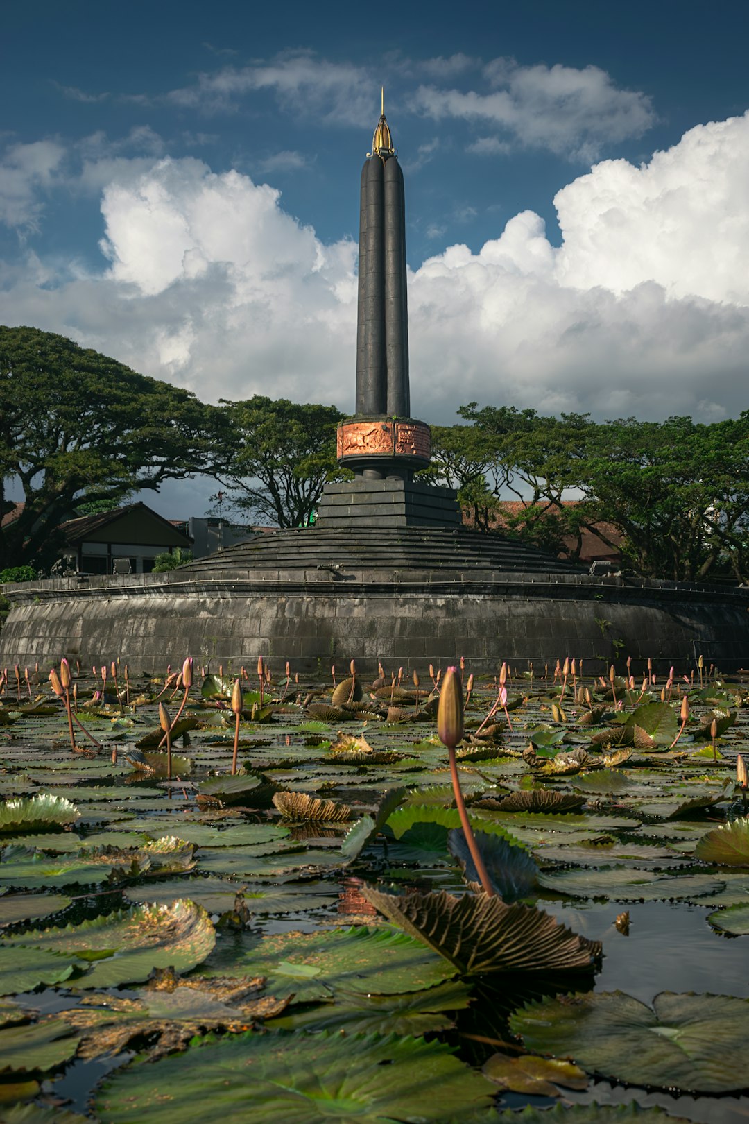 View of the fountain in front of Malangs city hall on a blue sky with clouds day. Malang, Indonesia, Mar/23.